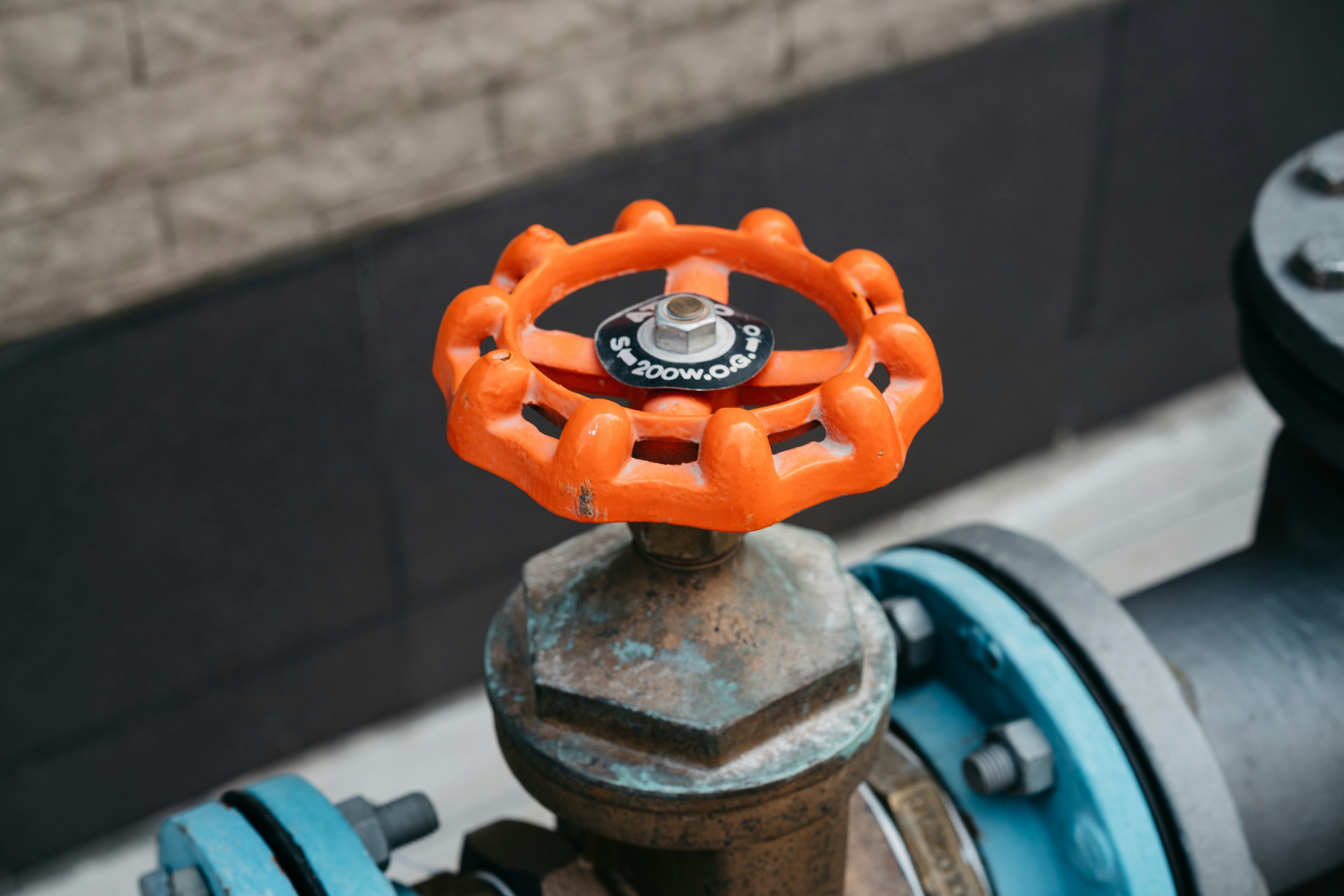 Pipes with regulators on it, red and blue